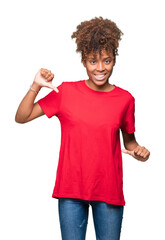 Wall Mural - Beautiful young african american woman over isolated background looking confident with smile on face, pointing oneself with fingers proud and happy.