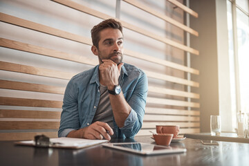 Wall Mural - Management, planning and thinking with coffee shop owner man at table for small business startup. Future, idea or vision and manager in cafe as restaurant service for checklist, inspection or stock