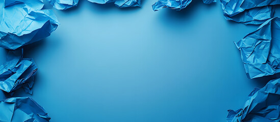 Background featuring crumpled blue paper with copy space image.