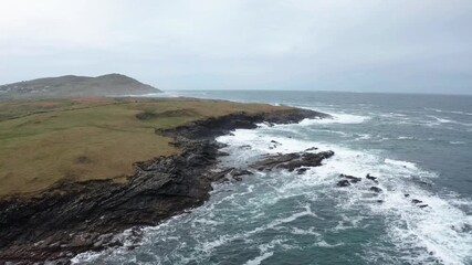 Wall Mural - Aerial view of Inishkeel island during a misty and hazy winter day - Portnoo, County Donegal, Ireland.