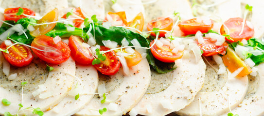 Wall Mural - A plate of food with a variety of vegetables and meat