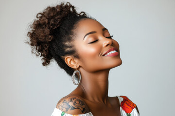 A close up of a tattooed black woman's face with her eyes closed