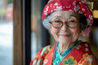 © syhin_stas - Elderly happy japanese woman wearing a kimono smiling during a keiro no hi, or respect for the aged day
