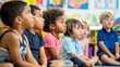 © keiron - Diverse group of kindergarten kids listening attentively in classroom, preschool education learning environment