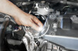 © NongAsimo - Car service system checks, Warranty concept, Technician of car service center check car engine parts, Customer service all time, Ensuring customer satisfaction, Marketing competition of automotive