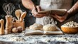 © Sunanta - Culinary Inspiration - Man Searching Recipe in Notebook and Kneading Dough in Kitchen
