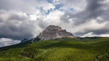 Wall Mural - Canadian rocky Mountains nature background. Cloudy Summer day.