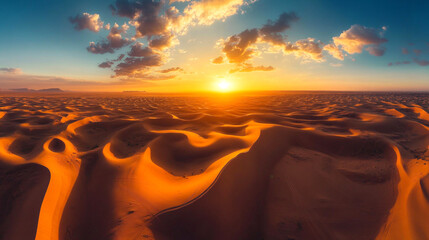 Wall Mural - A stunning desert landscape at sunset. The sun sets over rolling sand dunes creating beautiful shapes and shadows. A peaceful and serene scene that captures the essence of nature. AI