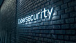 © Michael - Cybersecurity-themed neon sign on a dark brick wall represents the importance of protecting online data in the digital era