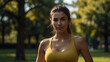 © Artistic Visions - attractive fit woman with a toned body wearing sports bra in park