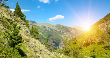 Wall Mural - Beautiful sunrise in mountain valley in Pyrenees.