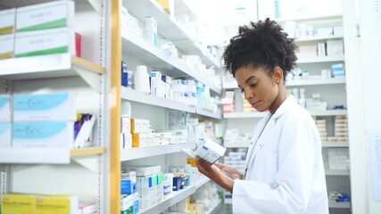 Poster - Black woman, pharmacist and tablet with box on shelf for medication, inventory inspection or dispensary at drugstore. African female person or doctor with technology for checking stock at pharmacy
