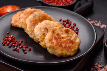 Delicious fresh fried minced fish cutlets with spices and herbs