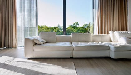 Wall Mural - Modern White Sofa in a Minimalist Living Room with Large Windows and Natural Light