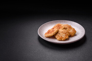 Delicious fresh fried minced fish cutlets with spices and herbs