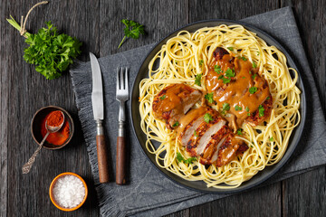 Canvas Print - Chicken Lazone with sauce and linguine on plate