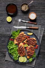 Wall Mural - grilled chicken breasts wrapped in bacon on plate