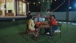 © InfiniteFlow - Family gather celebrate holiday. Parents, grandparents and girl together to talk and have dinner party food. Outdoor activity for spending time with multigeneration cross generation gap. Divergence.