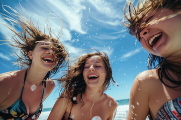 Friends laughing and enjoying a beach day together