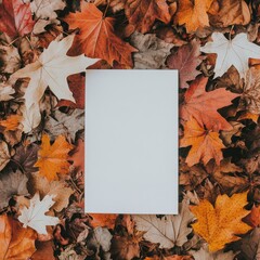 Sticker - Blank card surrounded by colorful autumn leaves on the ground in a forest setting