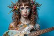 © McFly - Girl with drawings on her face with a guitar.