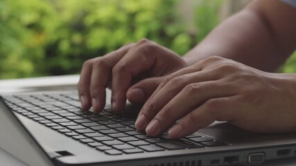 Poster - Close up of freelancer's developer hands typing program code on laptop keyboard in coworking. Businessman at work in working in cafe. Copywriter writing text on computer keyboard in coffee shop.