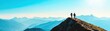 © Chanoknan - Two hikers standing on a mountain peak, enjoying stunning views of the vast blue landscape under a bright sky.