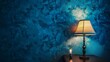 © Bonnie - Table with stylish lamp near color wall bulb under lampshade is against wall with blue wallpaper