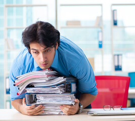 Sticker - Handsome businessman unhappy with excessive work in the office