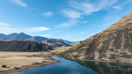 Wall Mural - Drone  image of Lake Pearson a high-country lake in the Waimakariri Basin of New Zealand