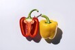© Aurel - A stunning food photography of a red pepper and a yellow sweet pepper