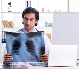 Sticker - Young handsome male radiologist in front of whiteboard