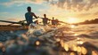 © florynstudio3 - Rowing team rowing in a boat on a lake, the sun setting in the distance with a water splash in the foreground.