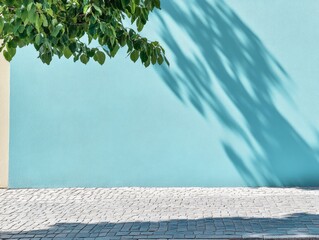 Aufkleber - Afternoon Light on Urban Light Blue Stucco Wall with Foliage Shadows and Cobblestone Street in a Calm and Serene Setting