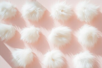Poster - Soft White Cat Fur on Pastel Pink Background Daytime Showcasing Minimalist Repetition and Clean, Bright Composition
