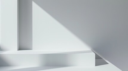 Poster - A white platform sits on a white floor in a minimalist interior. The platform is illuminated by sunlight from a nearby window, casting a dramatic shadow across the surface. The light and shadow create
