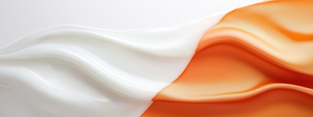  A close-up of a white and orange liquid with a wave pattern at the bottom The bottom of the liquid is white, transitioning into an orange wave pattern