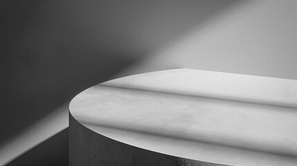 Poster - A circular concrete platform sits in a minimalist setting, illuminated by streaks of light. The platform is smooth and appears to be part of a larger structure. The lighting creates a stark contrast, 
