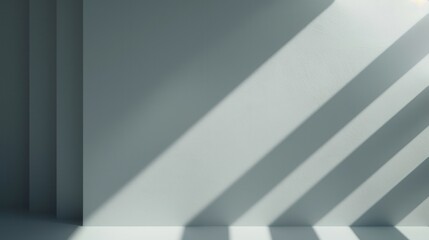 Poster - Sunlight streams through a window, casting long, diagonal shadows across a white wall in a modern interior. The shadows are sharp and defined, creating a dynamic and geometric pattern.