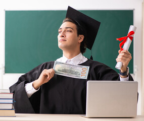 Wall Mural - Graduate student in front of green board