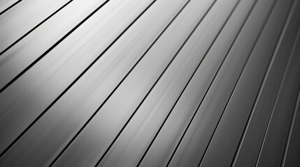 Poster - An abstract black and white image of diagonal metal lines. The lines are evenly spaced and reflect light in a way that creates a sense of depth and texture.