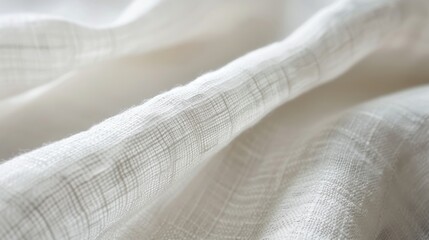 Poster - A close-up image of a white linen fabric with a delicate woven pattern. The fabric is soft and textured, with a slightly wrinkled appearance. The light catches the surface of the fabric, highlighting 