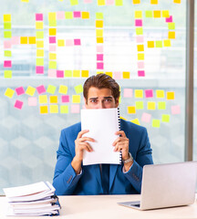 Wall Mural - Busy businessman working in the office