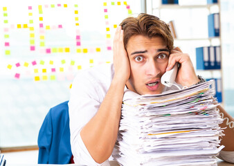 Wall Mural - Busy businessman working in the office