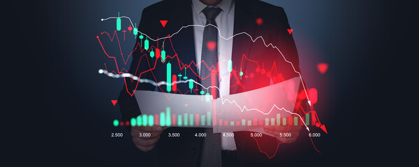 Poster - Businessman analyzing financial charts on dark background, stock market crisis concept.