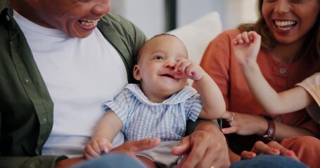 Wall Mural - Home, parents and baby with happiness, playing and cheerful with family, care and love in a lounge. Mother, father or infant on a sofa, fun or relax with newborn, bonding together or funny expression