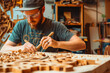 © VisualProduction - Woodworker crafting intricate furniture pieces in a workshop.