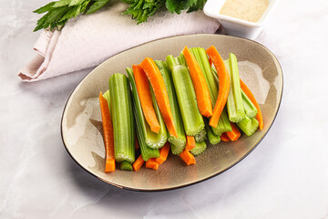 Wall Mural - Vegan cuisine - dietary celery and carrot cticks