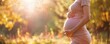 © Dalibor - Pregnant woman practicing mindfulness by the beach during sunset. Free copy space for text.