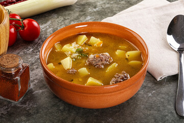 Canvas Print - Soup with beef meatball and vegetables